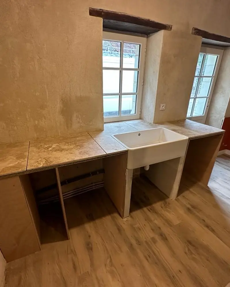 Después: Reformas: suelo laminado y encimera a medida